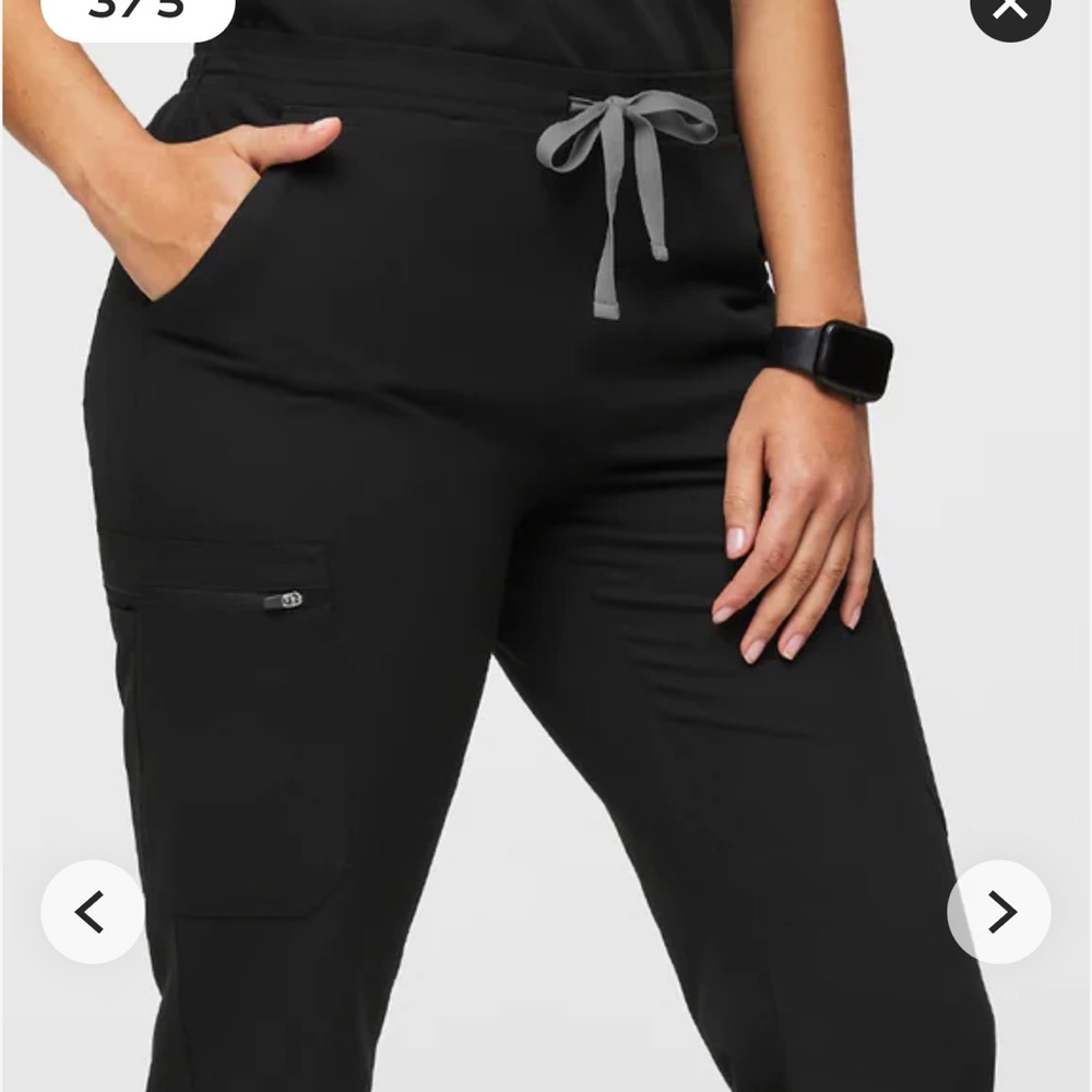 Figs yola black skinny scrub pants in size medium regular.